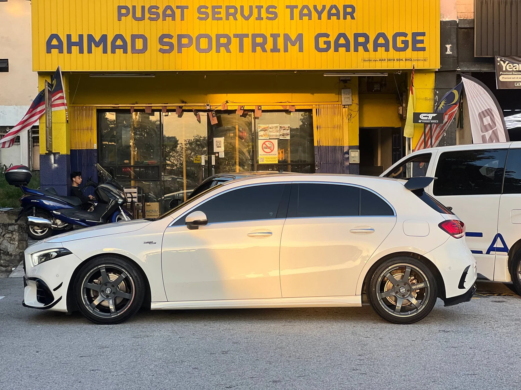 White Mercedes-Benz A-Class hatchback with grey six-spoke wheels outside ASG